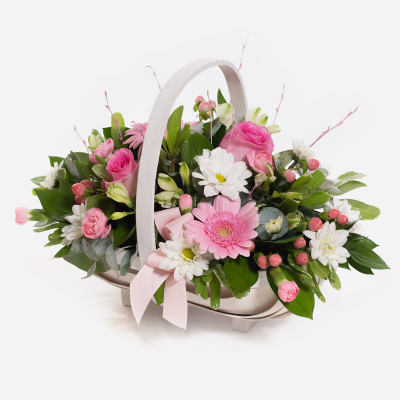 Baby Girl Pink Basket  - A floral basket overflowing with pick and white flowers, neatly arranged with foliage.
